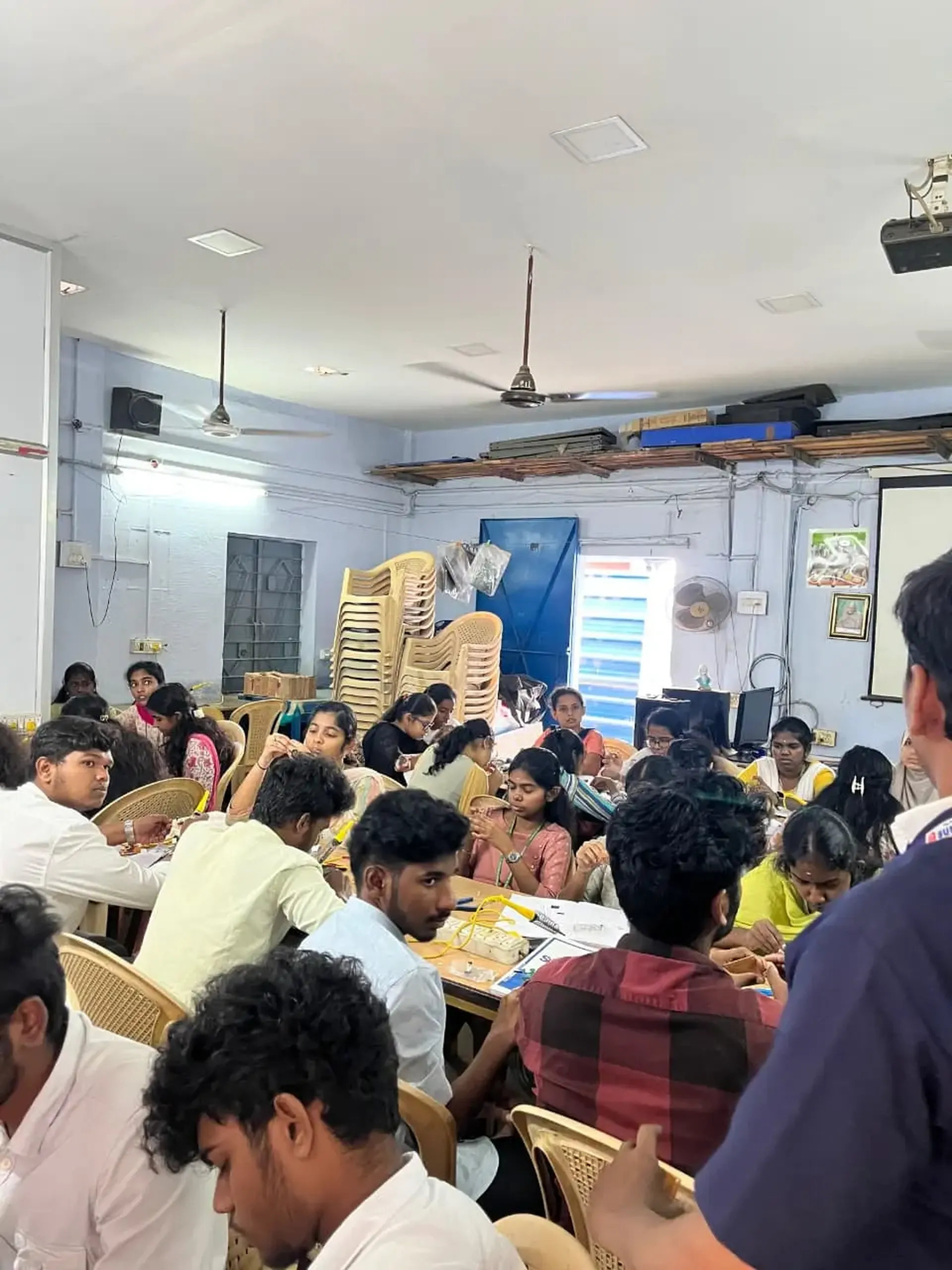 Students in an electronics workshop